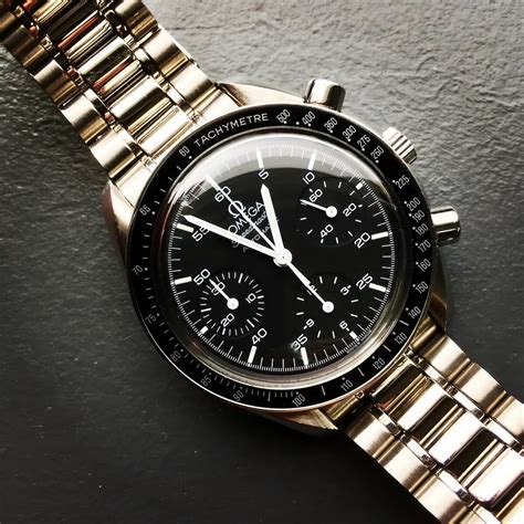 how to spot a fake omega speedmaster reduced|omega auction fraud.